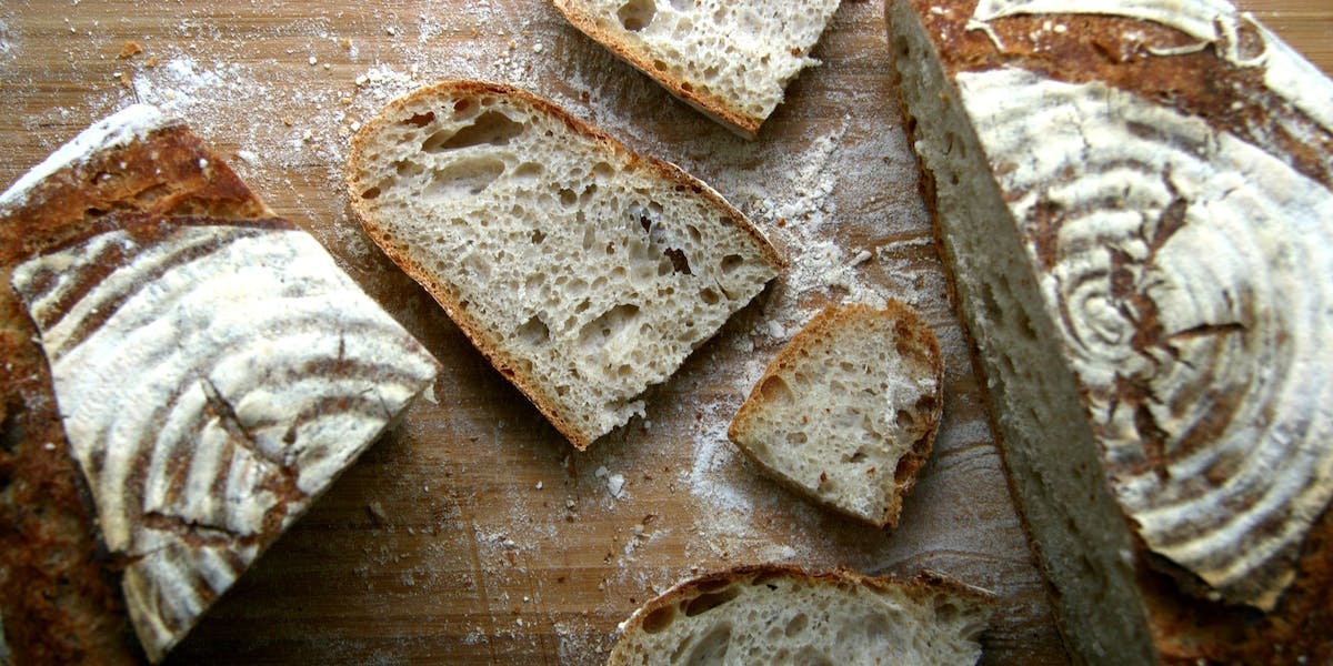 a loaf of sourdough cut into slices