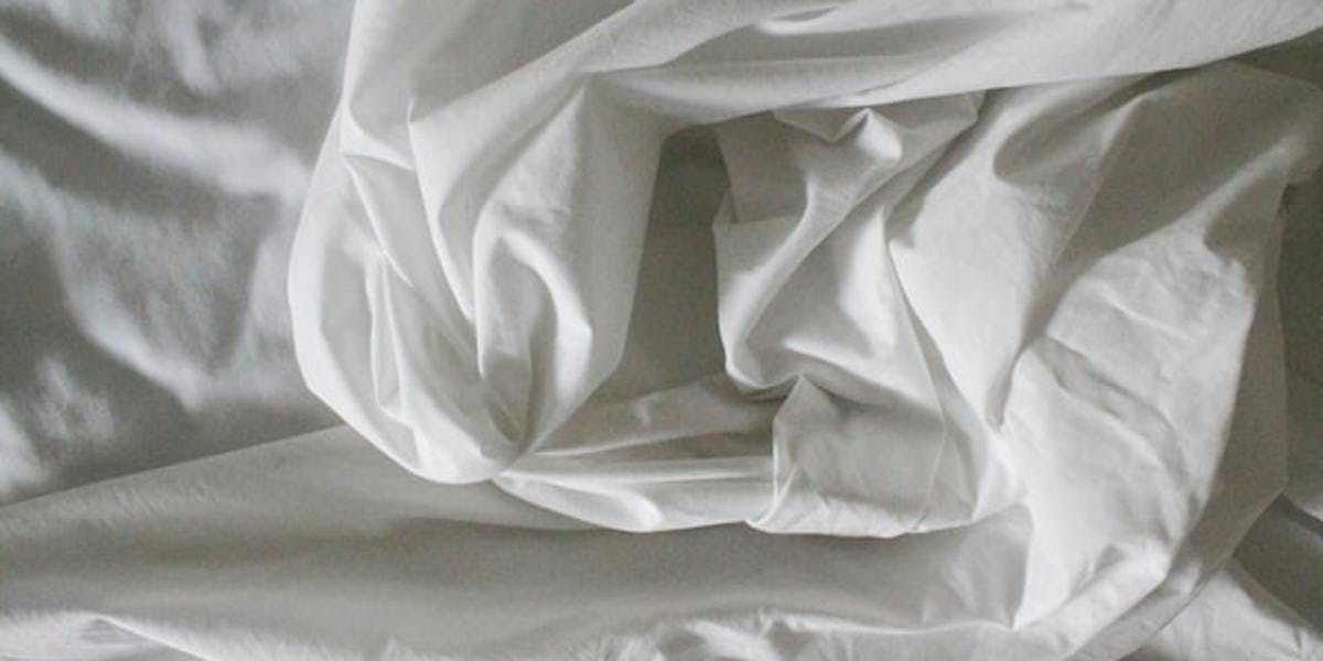 clean white bed sheets