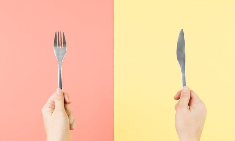 fork and knife in hands