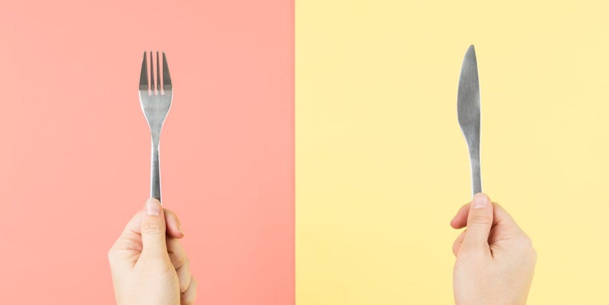 fork and knife in hands