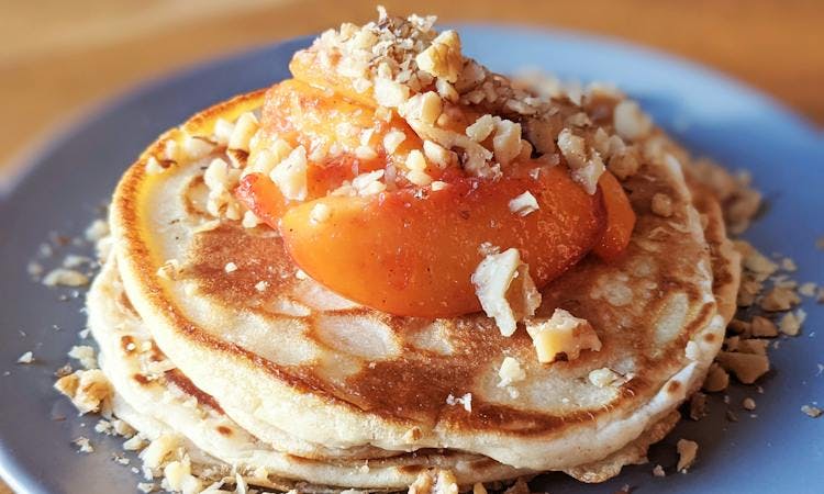 Pancakes with Caramelised Peaches, Syrup and Walnuts  image