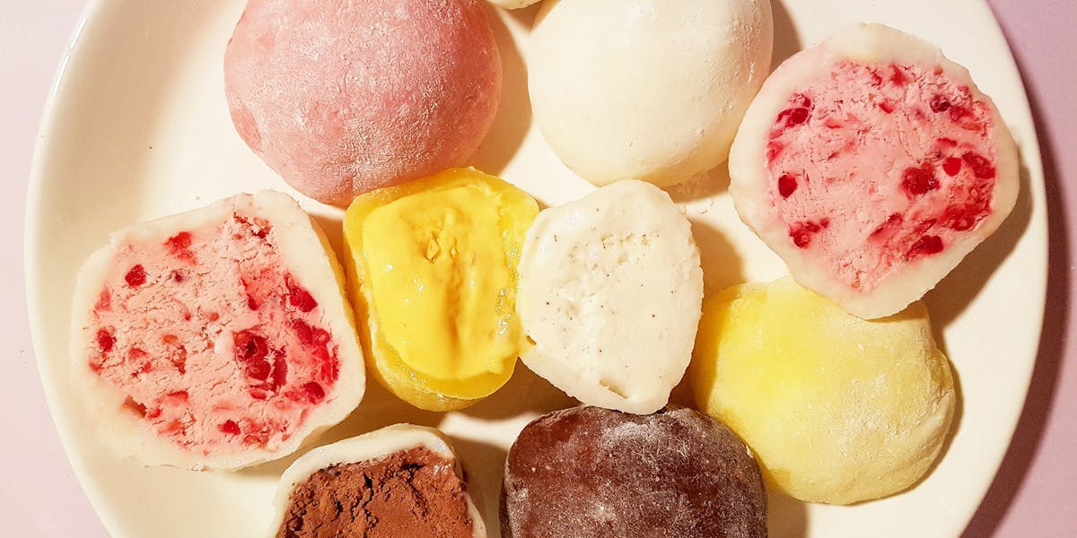 Colourful, different flavoured mochi ice cream served on a plate