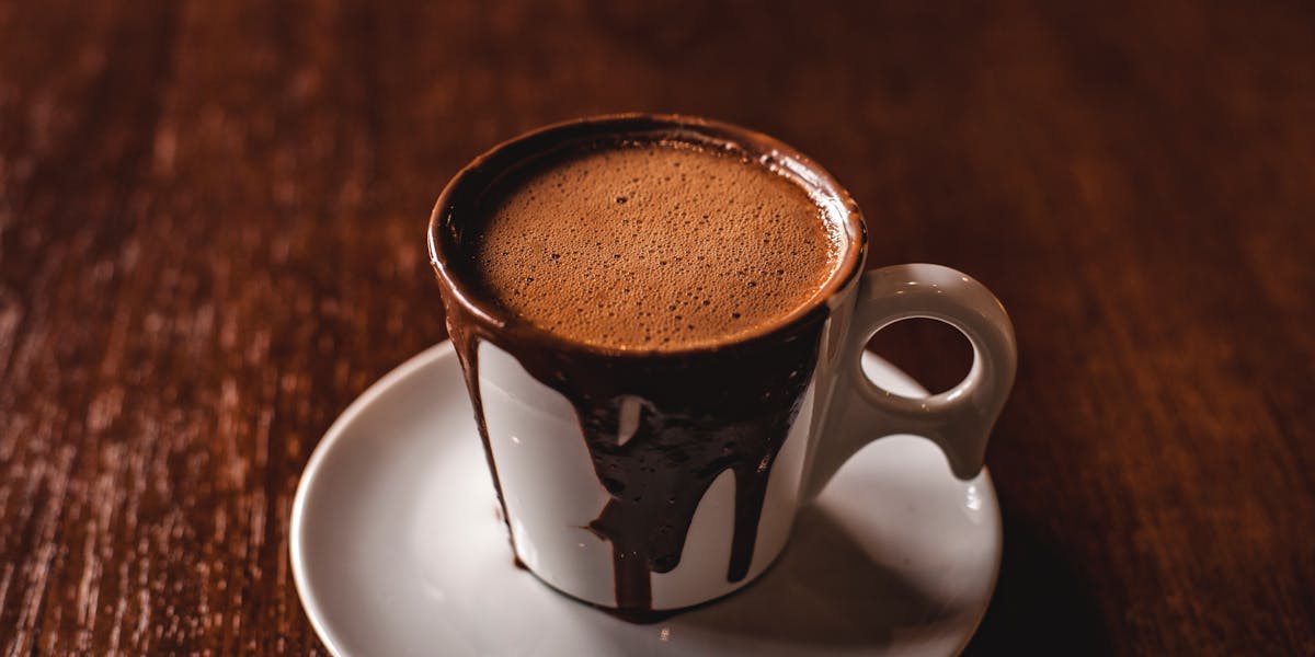 mug of hot chocolate on saucer