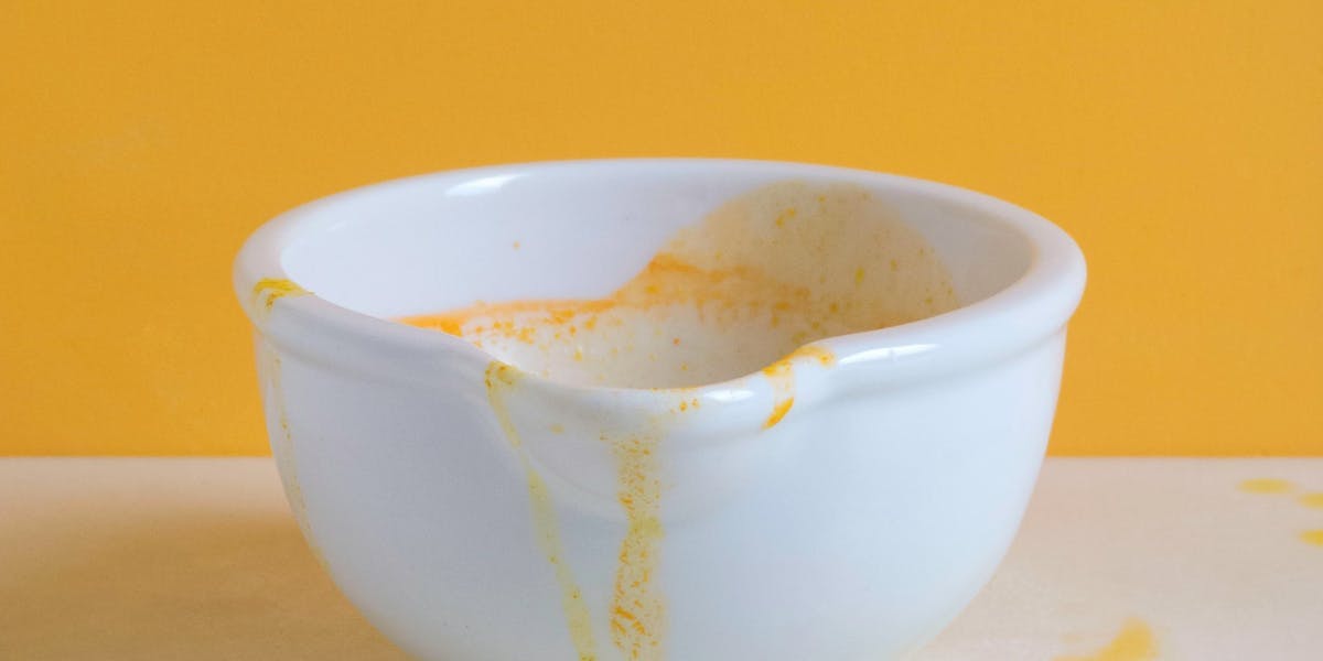 an empty bowl that was full of turmeric