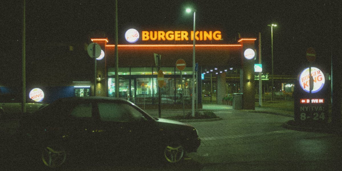 a burger king drive through at night
