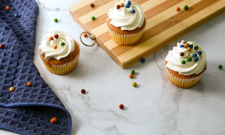cupcakes on wooden board