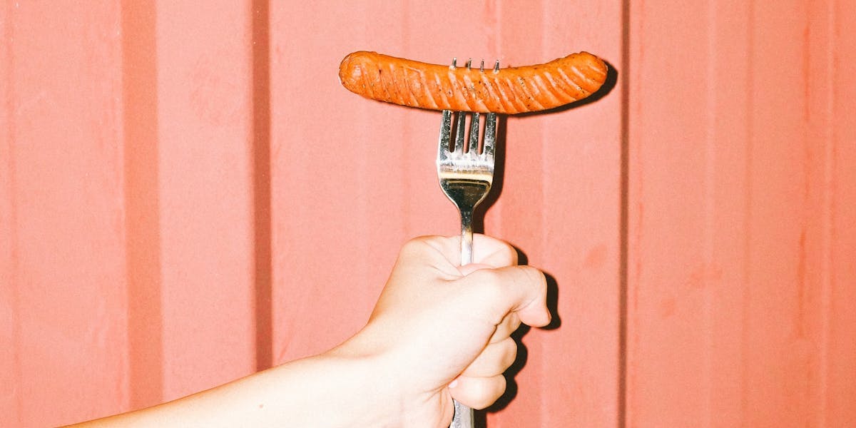 Sausage pierced on a fork