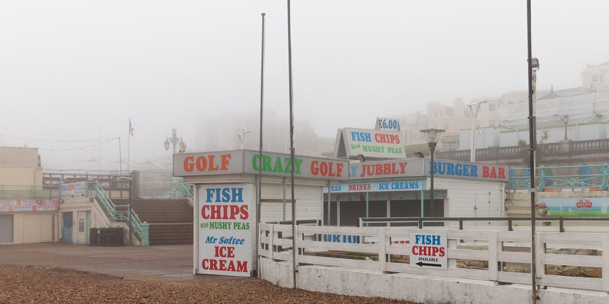 a seaside ship shop in fog