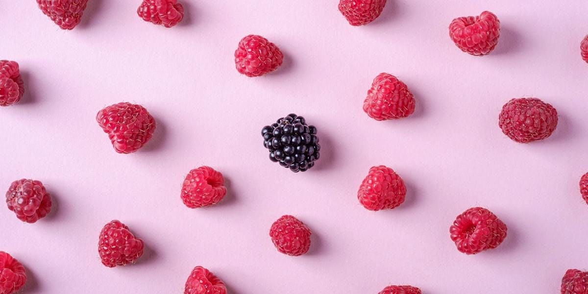 berries on pink background